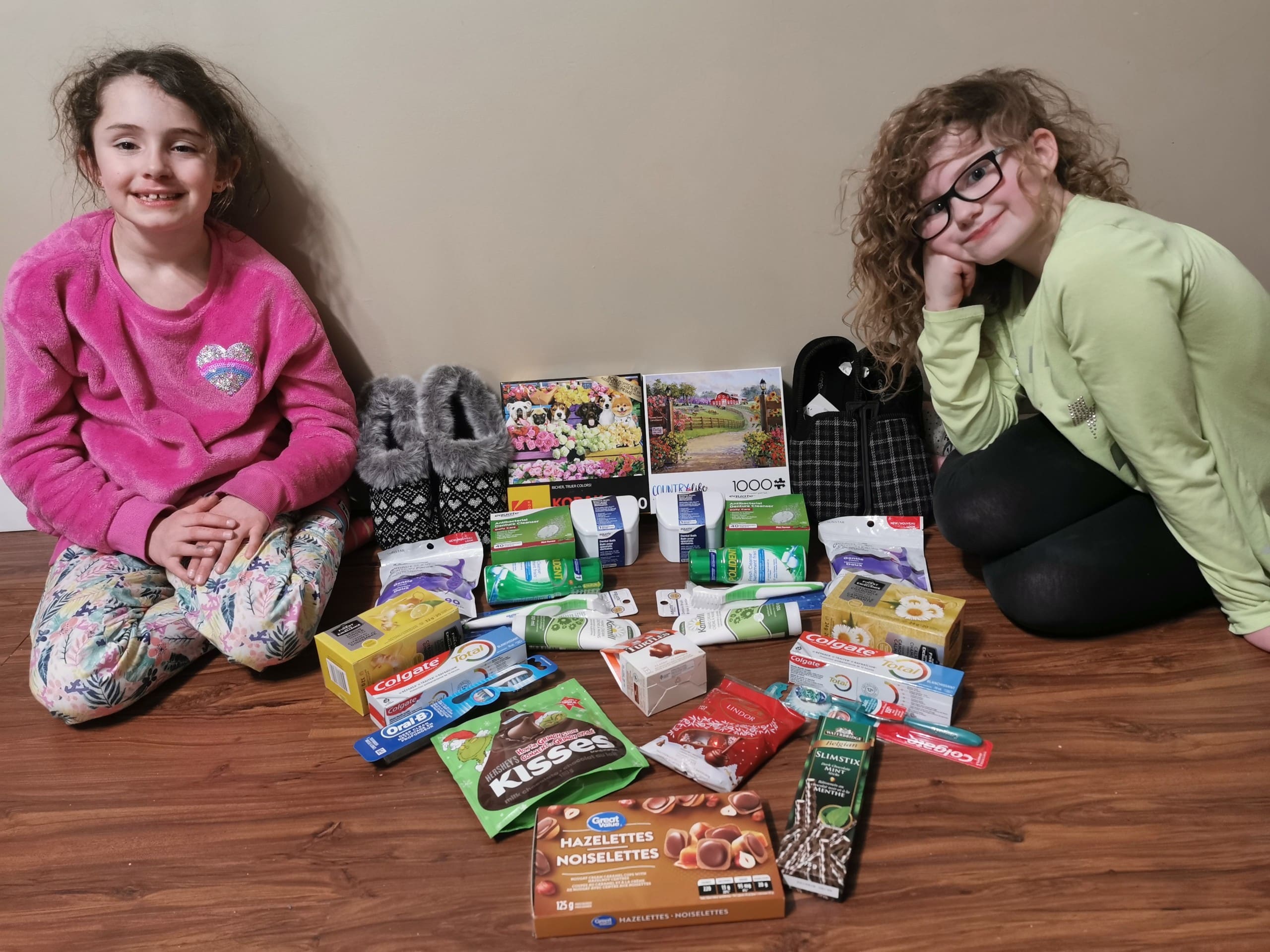 Adria, on the left, and C.K., on the right, Shields' kids with their contributions. (Supplied - Loranne Shields)